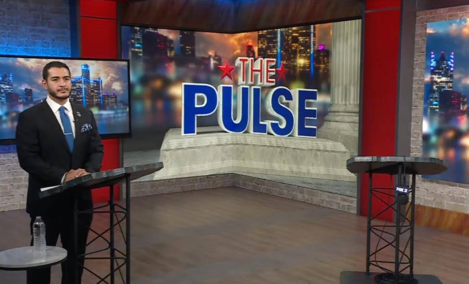 Abdul El-Sayed debating an empty podium
